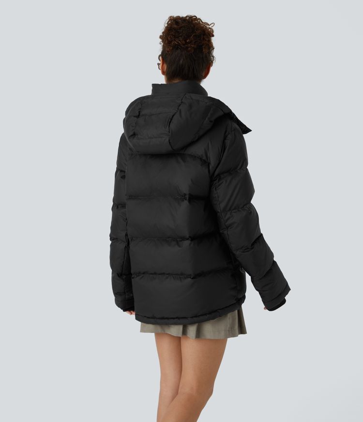 chaqueta acolchada informal con capucha extraíble cuello alto cremallera y bolsillos de manga larga.