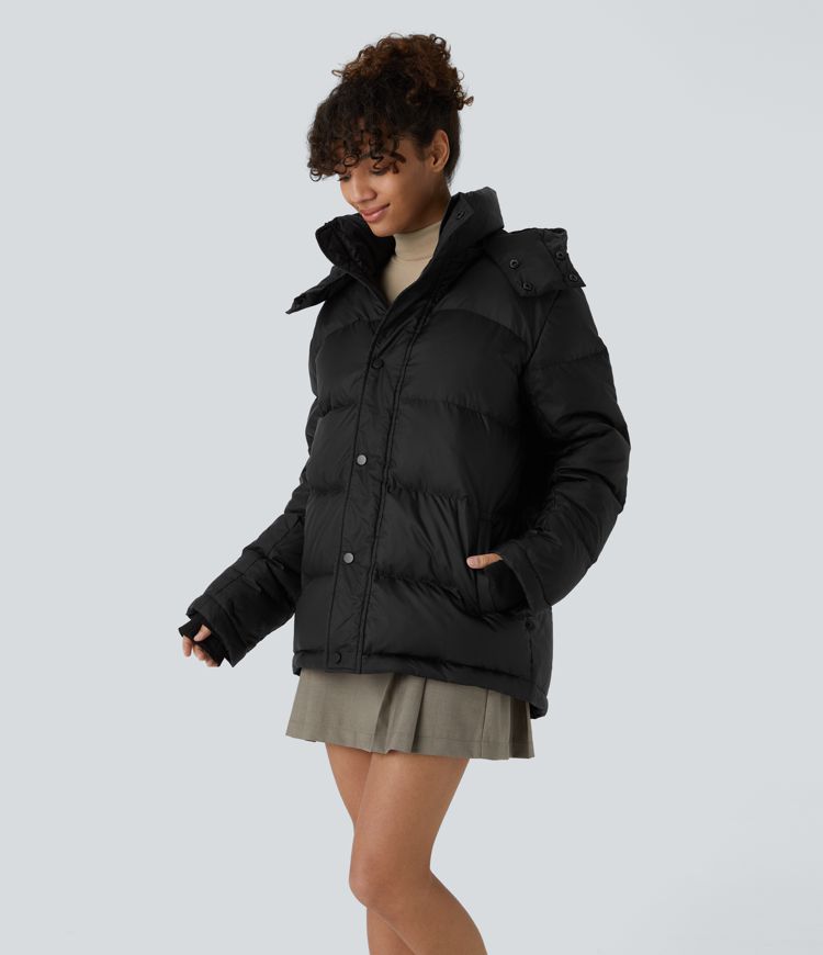 chaqueta acolchada informal con capucha extraíble cuello alto cremallera y bolsillos de manga larga.