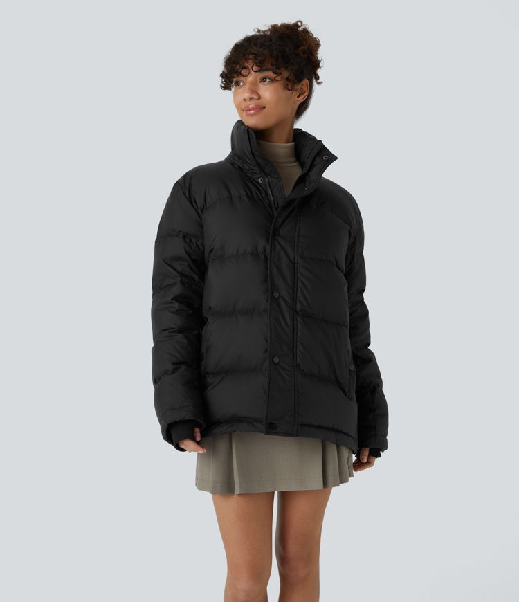 chaqueta acolchada informal con capucha extraíble cuello alto cremallera y bolsillos de manga larga.