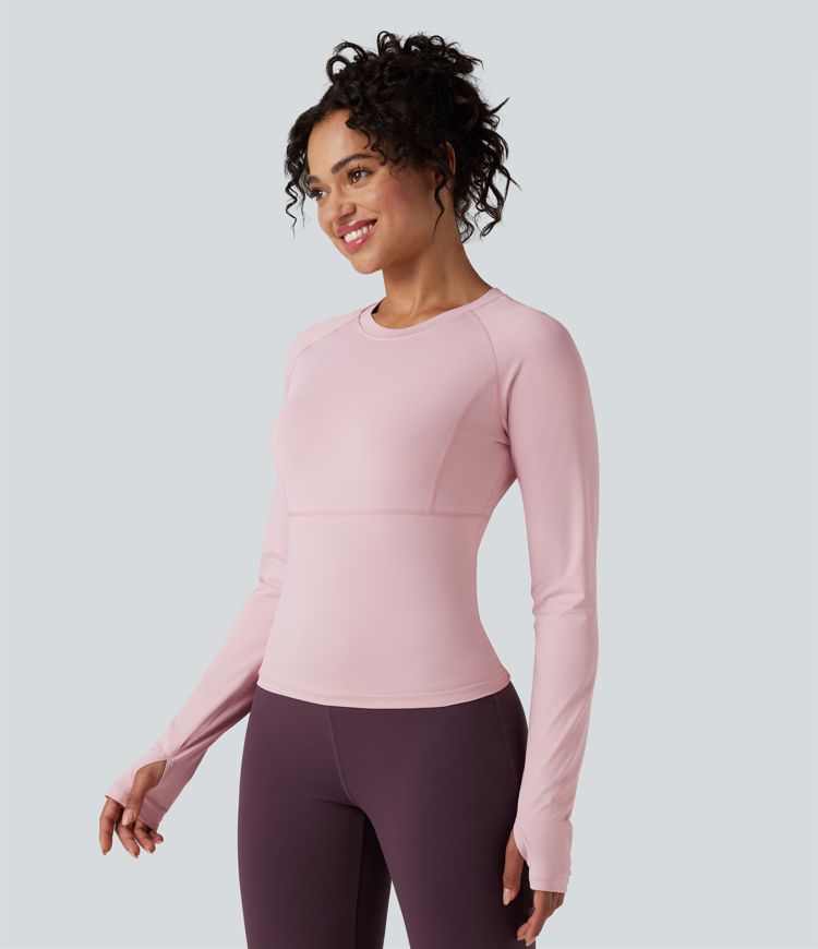 top deportivo de yoga con mangas largas y push up con abertura para el pulgar
