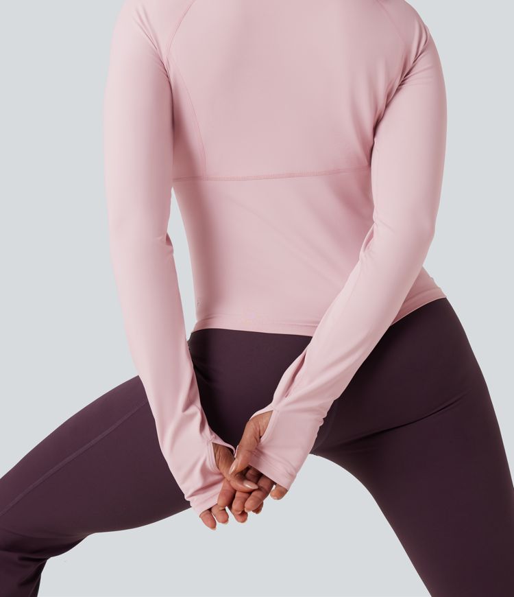 top deportivo de yoga con mangas largas y push up con abertura para el pulgar