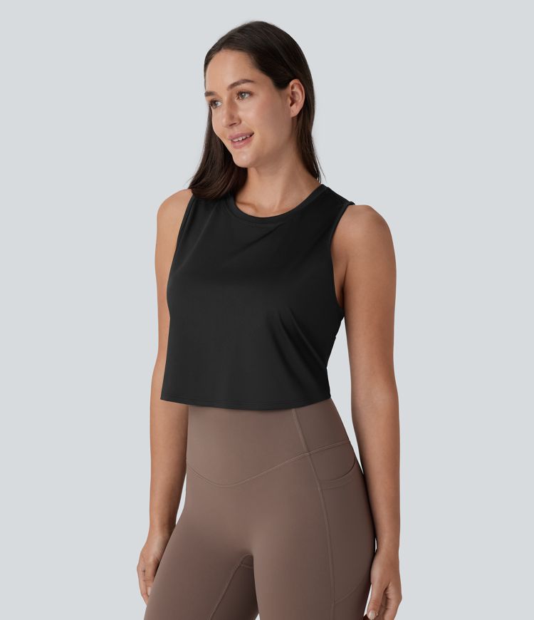 top de yoga corto liso con dobladillo cruzado y aberturas