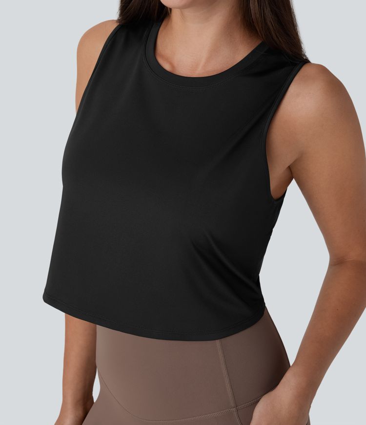 top de yoga corto liso con dobladillo cruzado y aberturas