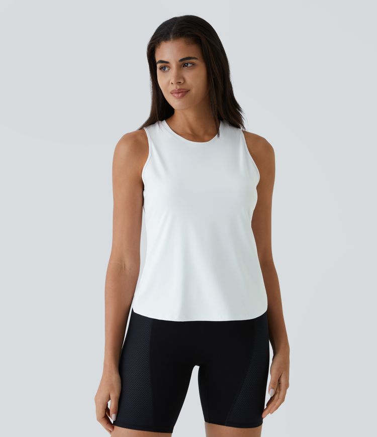 top de yoga liso con dobladillo cruzado y cortes