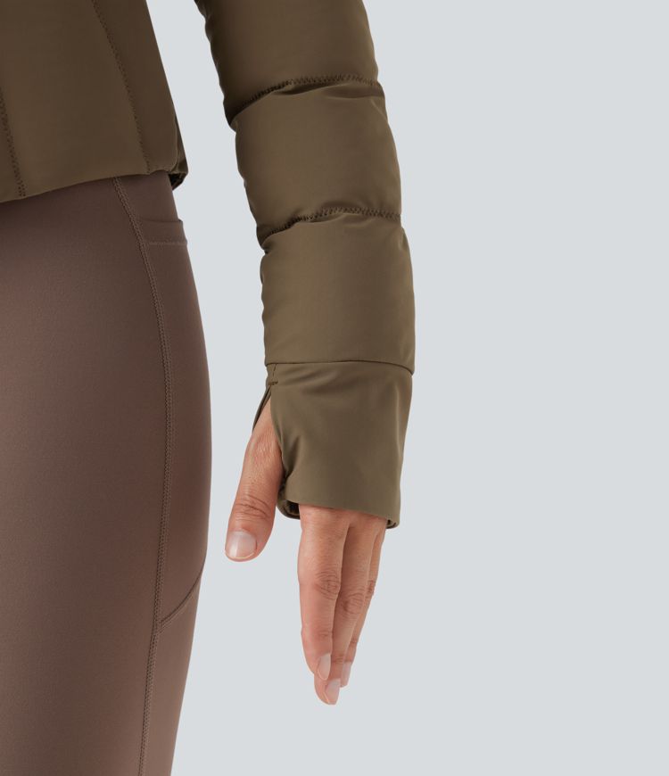 chaqueta acolchada de entrenamiento elástica puffflex con cuello alto aberturas para los pulgares y bolsillos
