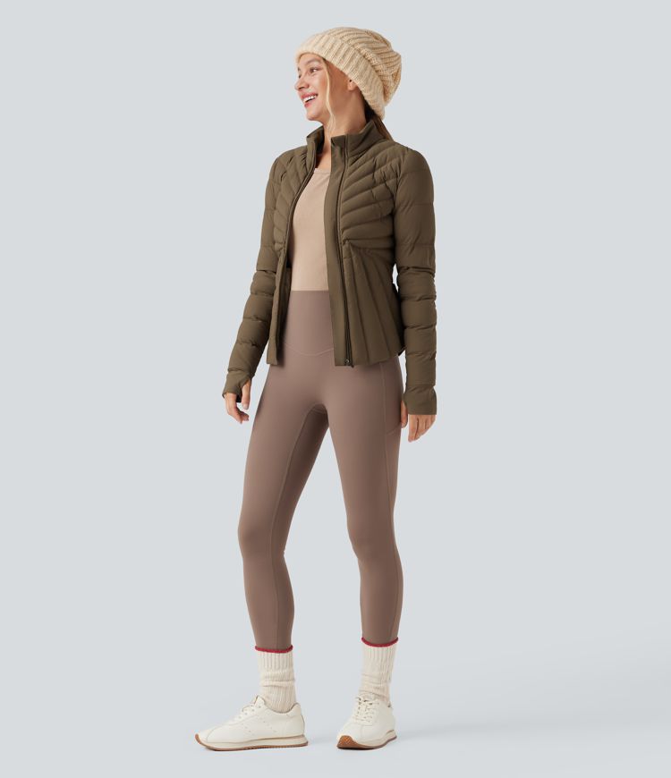 chaqueta acolchada de entrenamiento elástica puffflex con cuello alto aberturas para los pulgares y bolsillos